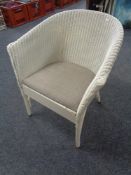 A mid 20th century painted loom armchair