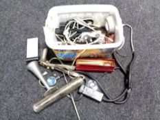 A tub containing a quantity of medical instruments,