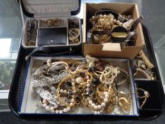 A tray containing a quantity of assorted costume jewellery