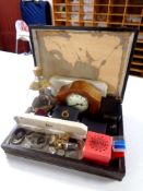 An inlaid mahogany mantel clock (battery operated) together with an oak canteen containing dimple