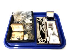 A tray of costume jewellery, pearls, silver plated vesta case,