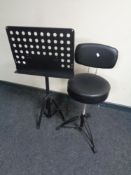 An adjustable music chair together with an adjustable music stand