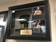 A sporting memorabilia montage : A signed UFC boxing mitt Conor McGregor,