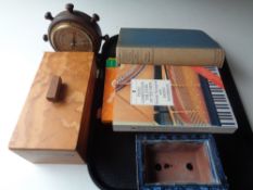 A tray containing music books, wooden trinket box, glazed pottery planter,