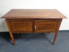 An Edwardian inlaid mahogany wash stand