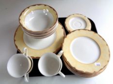 A tray containing 32 pieces of Marks & Spencer's gold Arabesque tea and dinner china