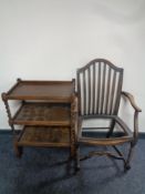 An oak shield back barley twist armchair (as found) together with an oak three tier barley twist