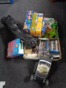 A box containing assorted games together with a box of DVDs,