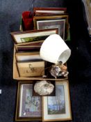 Two boxes containing pictures, figural table lamp with shade,
