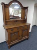 An Edwardian oak mirror backed sideboard