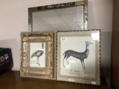 A Chinoiserie mirror together with two gilt framed pictures of mythical beasts