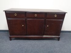 A Stag triple door sideboard