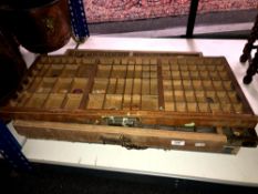 Five wooden printer's type trays