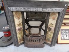 A tiled cast metal fire insert