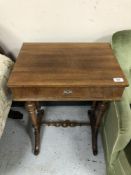 A Continental mahogany work table