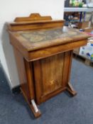 A Victorian inlaid walnut Davenport