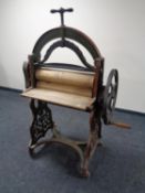 An antique cast iron mangle