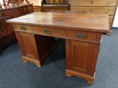 An Edwardian twin pedestal desk