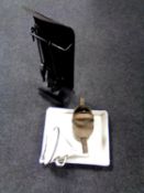 A contemporary three piece companion set with stand together with vintage enamel tray,