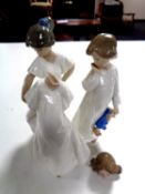 Three Nao figures CONDITION REPORT: One damaged.