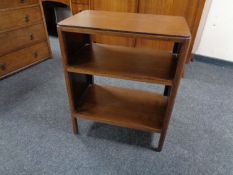 An oak three tier book table