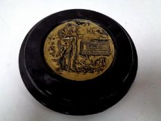 A WWI death plaque mounted in frame