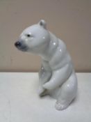 A Lladro figure of a polar bear.