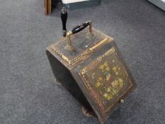 A 19th century hand painted tin coal receiver with shovel