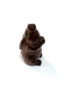 A carved Chinese hardwood netsuke - Wild rabbit seated