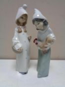 Two Lladro figures of a girl with cockerel and a girl with basket.