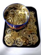 A tray of horse brasses
