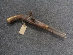 A non-firing copy of a flintlock pistol