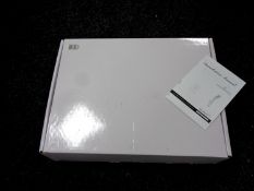 A Soak.com thermostatic shower, boxed.