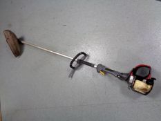 A Honda four stroke petrol strimmer
