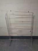 Seven folding metal shoe racks