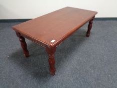 A contemporary coffee table in an antique finish