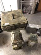 A sundial on weathered concrete pillar signed Thomas Grice and dated 1705,