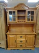 A contemporary dresser with cupboards and drawers below