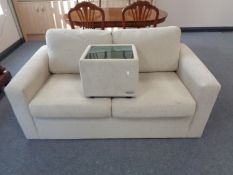 A Jay-be two seater bed settee and matching glass topped footstool