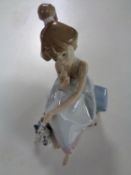 A Lladro figure of a girl and a dalmatian No.