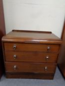 An oak three drawer chest