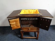 An oak work table fitted a drawer
