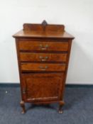 A burr walnut record cabinet