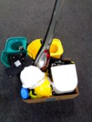A box containing hard hats, high vis clothing, spirit level, Morphy Richards vacuum,