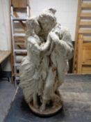 A weathered concrete garden figure - Lady & Gent