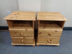 A pair of pine bedside chests