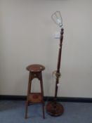 An oak standard lamp and an occasional table