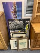 Three wall canvases and prints plus a wicker standard lamp