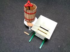 A Clarke apple press together with a metal apple mulcher