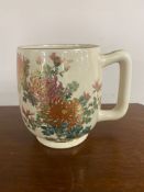 A Japanese Satsuma earthenware mug,